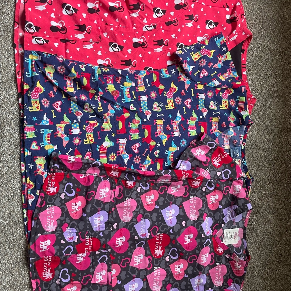 Assorted animal print scrub tops